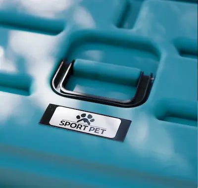 Blue box with black handle and sport pet emblem